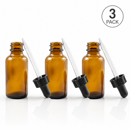 Tre 10 ml pipetteflasker i brunt glass med sorte pipetter til eteriske oljer, serum og DIY-produkter